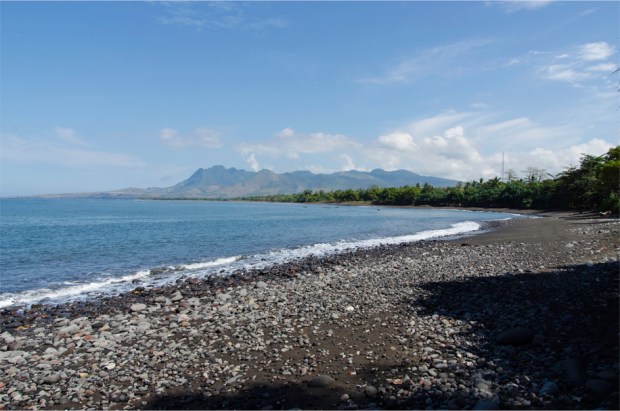 The black sand beach at Aimere