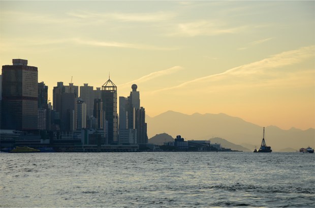Looking westward, the mountains of Lantau island are visible in the distance