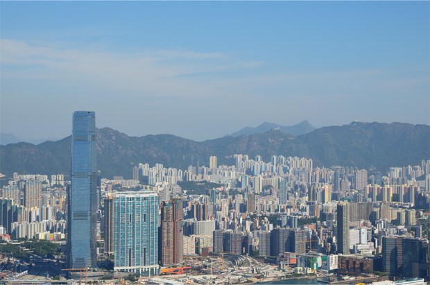 The skyscrapers of Kowloon, with Ma On Shan's distinctive saddle just over the ridge