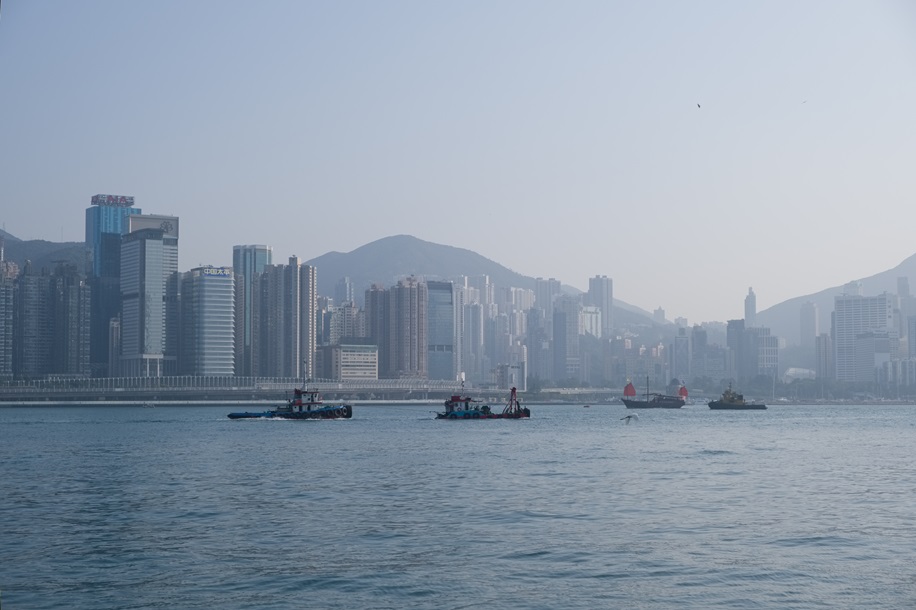 Looking across Victoria Harbour from a promenade in Kowloon’s Hung Hom area